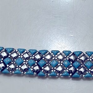 Vintage bracelet. Silver tone w/ blue enamel. Solid. Safety closure. Geometric